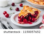 Homemade Cherry Pie with a Flaky Crust on Grey stone background. 
