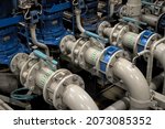 Industrial valves, pipes in modern offshore ship's engine room