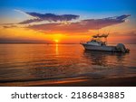 Sea boat at dawn landscape. Beautiful sunrise over sea boat. Sea boat at dawn. Sea boat at dawn