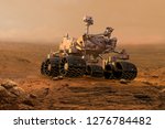 Mars Rover Exploring Surface Of ...