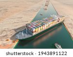 Maritime traffic jam. Container cargo ship run aground and stuck in Suez Canal, blocking world
