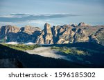 Small photo of Eyeshot from the Alpe di suisi to range of mountains, Picturesque. Alpe di Siusi or Seiser Alm with Sassolungo and Langkofel mountain group, South Tyrol, Italy