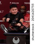Small photo of Tokyo, Japan - 15 Sept 2021: Bonnie Bunyau Gustin of Malaysia reacts after lifting 228 kilograms in the men's 72-kilogram powerlifting final at the Tokyo 2020 Paralympic Game at Tokyo. He won gold.