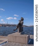 Small photo of Troubadour statue on a parterre, Evert Taube, at the bay Riddarfjarden, a sunny spring day in Stockholm, Sweden 2022-04-05