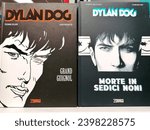 Small photo of Rome, Italy - December 08, 2023, detail of Dylan Dog book covers. Grand Guignol and Dylan Dog. Death in sixteen ninths.