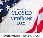 We will be closed for Veterans Day. Close-up, view from above, no people. Congratulations for loved ones, relatives, friends and colleagues. Holiday concept