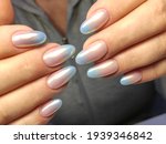 beautiful manicure of nails on the background of a fashionable texture