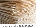 Wooden Boards Are Stacked In A...
