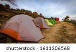 Small photo of Camps after trekking on Nag Tibba trek located in Dehradun Uttarakhand India. Natural beauty in Uttarakhand. Mountains view of Nag Tibba Trek with base camp starting from Pantwari Village. - Image