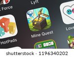 Small photo of London, United Kingdom - October 05, 2018: Close-up of the Mine Quest - Dungeon Crawling RPG icon from Tapps Tecnologia da Informacao Ltda. on an iPhone.