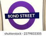 Small photo of London, England, UK - October 21st 2023: Bond Street Elizabeth Line roundel sign