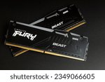 Small photo of Kingston Fury Beast 32GB DDR5 RGB RAM. Two modern high-performance memory modules DDR5 on a black background. Astana, Kazakhstan - July 20, 2023