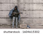 Homeless Man Holding A Guitar ...