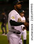 Small photo of Oakland, California - July 5, 2022: Oakland Athletics shortstop Elvis Andrus looks to the stands during a game against the Toronto Blue Jays at the Oakland Coliseum.