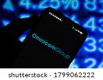 Small photo of August 19, 2020, Brazil. In this photo illustration the Omnicom Group logo seen displayed on a smartphone