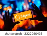Small photo of June 24, 2023, Brazil. In this photo illustration, the Fulgent Genetics logo is displayed on a smartphone mobile screen