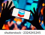 Small photo of June 29, 2023, Brazil. In this photo illustration, the Chevron logo is displayed on a smartphone screen