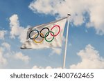 Small photo of December 14, 2023, Brazil. In this photo illustration the International Olympic Committee (IOC) soon appears on a flag