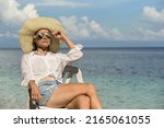 a lady in a straw hat ... | Shutterstock . vector #2165061055