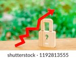 Small photo of Padlock and red arrow up. concept of increasing security and secrecy, protecting private data, legal assistance. Increase in the level of safety. Invulnerability. The growth of crime and theft of data