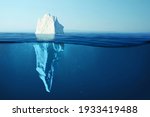 Iceberg In Clear Blue Water And ...