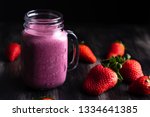 fresh strawberry milkshake | Shutterstock . vector #1334641385