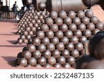 Pyramids of cannonballs and cannons in Monaco