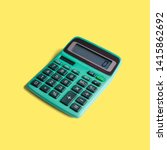 Small photo of Vintage pocket calculator, with both battery and solar power, and math operations limited to multiplication, division, addition, subtraction and square root. Isolated on a punchy pastel background