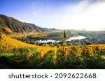 Small photo of The Moselle loop, a beautiful river in Germany, makes a 180 degree loop. with vineyards and a great landscape and lighting in the morning. the church tower and the town of Bremm in autumn