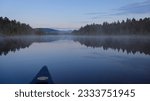 Small photo of Canoeing on First Roach Pond in the early morning hours. Maine, USA, July 8th, 2023