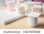 Plastic Cup With Tasty Yogurt...