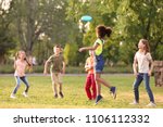 Cute little children playing with frisbee outdoors on sunny day