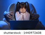 Stranger reaching frightened little child with laptop on color background. Cyber danger
