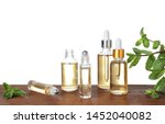 bottles of mint essential oil... | Shutterstock . vector #1452040082