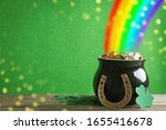 Pot with gold coins  horseshoe...