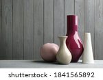 Stylish Ceramic Vases On Grey...
