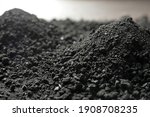 Heap of black coal, closeup view. Mineral deposits