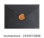 Black envelope with wax seal isolated on white, top view