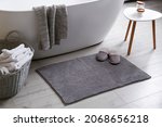 Soft Grey Mat With Slippers On...