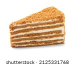 Slice of delicious honey cake isolated on white