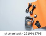 Exercise mat and other sport equipment on white background, flat lay. Space for text