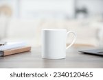 White ceramic mug and notebooks on wooden table indoors. Space for text