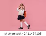 Happy schoolgirl in glasses...