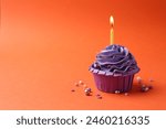 Delicious birthday cupcake with ...