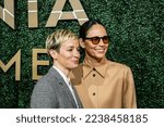 Small photo of SACRAMENTO, CA - U.S.A. - DEC. 13, 2022: Soccer star Megan Rapinoe poses with fiancee Sue Bird at the California Museum. Rapinoe was inducted into the state's prestigious Hall of Fame.