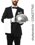 Small photo of Waiter with tray and cloche on white background