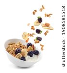 Small photo of Bowl with tasty granola, yogurt and fruits on white background