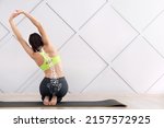 Young woman training in gym. Concept of healthy spine