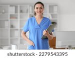 Female medical assistant with...