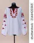 White embroidery with large...